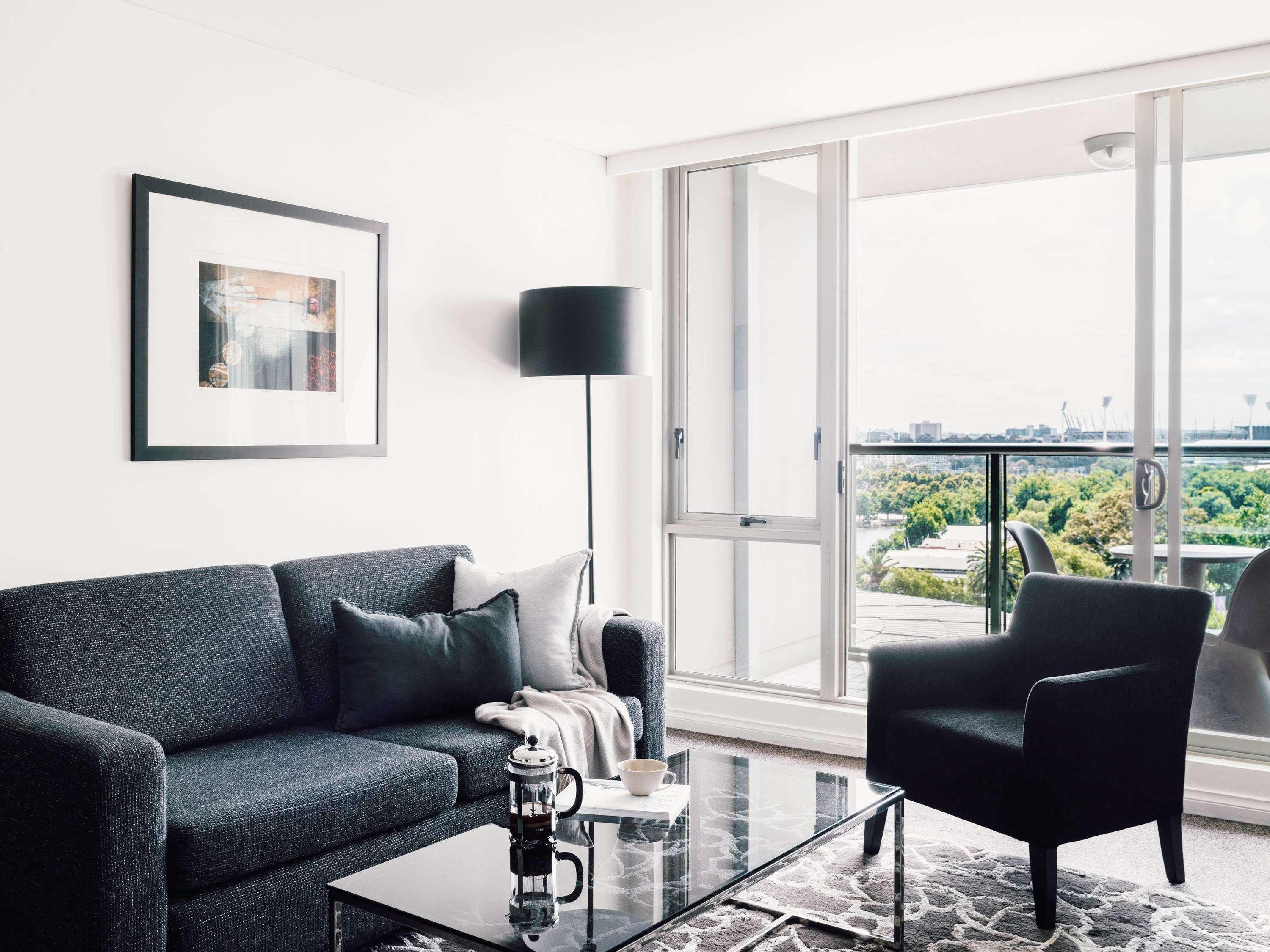 Quay West Suites Melbourne City Exterior foto A living room